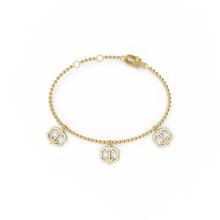 Chaînette triple monogramme dorée